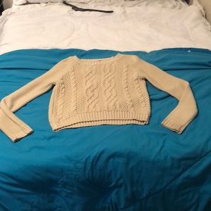 i’m selling a cream / tan sweater.